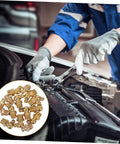 Mechanic using a 60-piece grease fitting assortment kit with 1/4-28 SAE-LT copper threaded lubrication nozzles on vehicle engine