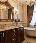 Luxurious bathroom with elegant decor, showcasing a vintage mirror, dark wooden cabinet, and deep soaking tub.