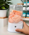Portable Underwear Washer Mini Compact Laundry Device Built In Rechargeable Battery Perfect For Dorms Apartments And Travel Quick Spin Cycle with towels in container.
