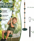 Child on outdoor climbing rope with platform and disc swing seat set for trees and backyards, hanging strap and carabiner shown