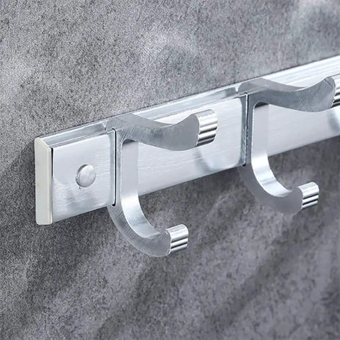 Super Sturdy Wall Mounted Coat Hooks Space Saving Aluminum Entryway Key Holder Rack Nordic Silver Finish with three hooks on wall.