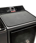 Top Shelf Silicone Washer And Dryer Cover 26 X 18 Inch Non Slip Waterproof Protector Mat on black washer top.
