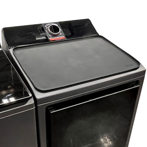 Top Shelf Silicone Washer And Dryer Cover 26 X 18 Inch Non Slip Waterproof Protector Mat on black washer top.