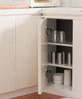 Smooth Operator 135 Degree Lazy Susan Hinges For Corner Cabinets with Nifty 4D Adjustment, installed in a cupboard with open door.