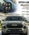 Heavy Duty Hole Free Ditch Light Brackets For 2024 2026 Toyota Tacoma And 2022 Plus Tundra With 2025 Plus 4Runner hood mount LED pod installed on vehicle.
