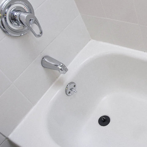 Black drain plug from Four Piece Tub Stopper Set With Hanging Ring Rubber Drain Plugs For Tub Sink Kitchen And Bathroom In Black Fits One And One Eighth To One And Seven Eighths Inch Drains in bathtub