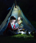 Two children reading under a blanket tent illuminated by the Rechargeable LED Work Light With Magnetic Base And 360 Degree Rotating Head
