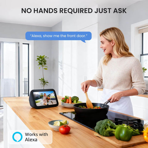 Woman in kitchen using Alexa to view Wireless 2K Doorbell Camera With No Monthly Fees, Ultra Wide View on smart display