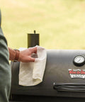 Crocodile Cloth Grill wipes used on a King-Griller barbecue; large plant-based, pre-moistened wipes.