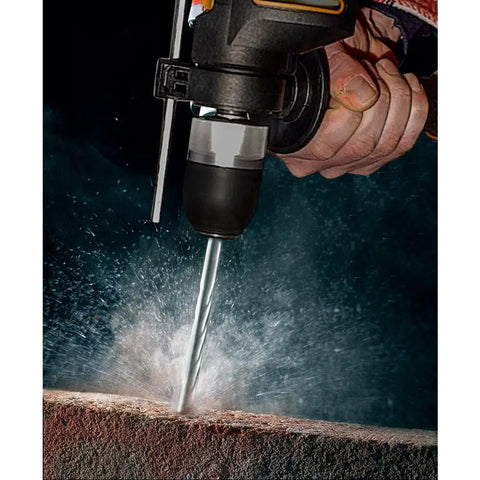 Close-up of Heavy Duty 600 Watt Impact Drill Driver With 13 Mm Keyless Chuck drilling into concrete.