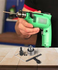 Person holding drill above Mini Lathe Drill Chuck Set With 0.3 To 4mm Capacity And Pro Grade 4mm 5mm 6mm 8mm Sleeve on table