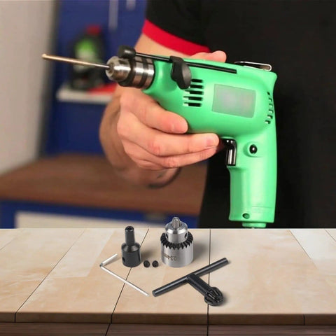 Person holding drill above Mini Lathe Drill Chuck Set With 0.3 To 4mm Capacity And Pro Grade 4mm 5mm 6mm 8mm Sleeve on table