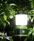 LED Camping Lantern Battery Powered Lights Portable Lanterns For Emergency Power Outages Hurricanes Outdoor Hiking And Survival Gear Home Use 2 Pack All Weather Ready hanging on tree branch
