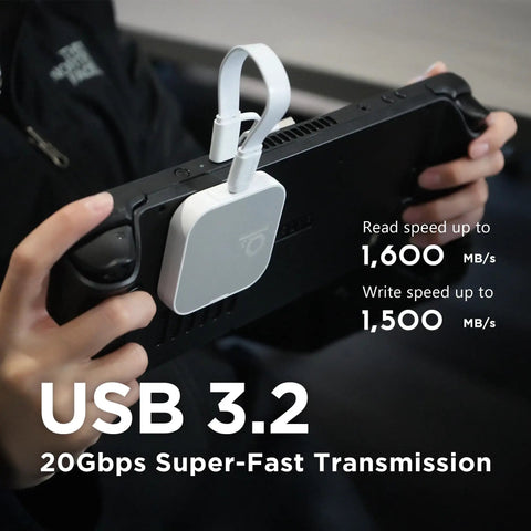 Person using a Magnetic External SSD 1TB For On The Go Storage With MagSafe Portable USB 3.2 Gen 2x2 Drive for fast data transmission.
