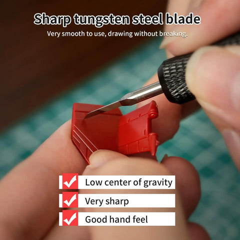 Close-up of precision use of the Pro Grade 7 Piece Tungsten Steel Scribing Tool Set With Wooden Stand on a red plastic model piece.