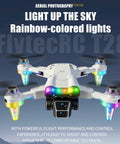 Kids Camera Drone for Ages 8 to 12 with LED Lights, featuring rainbow-colored lights and foldable design, front view.