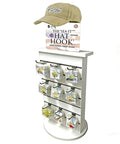Two Sided Slatwall Counter Spinner Display Rack In Maple Finish For Giftware And Jewelry, Rotating Spin Rack With Black Base, Ideal Countertop Display For Hooks And Small Accessories showcasing small items in slots.