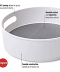 12 Inch Non Skid Lazy Susan Turntable Organizer With Easy Glide Spin And Sturdy Handles For Kitchen Pantry Cabinet Bathroom Laundry Garage showing gray non-skid surface and white round base.