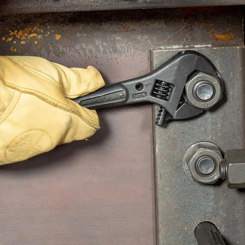 Using Extra Wide Adjustable Wrench for Heavy Nuts and Bolts by Klein Tools, 10 Inch Spud Wrench With Tether Hole to tighten a bolt