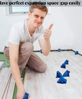Man using Flooring Spacers 1/2 Inch And 1/4 Inch Pack Of 40 For Laminate LVP Vinyl Plank Engineered Floors showing thumbs up