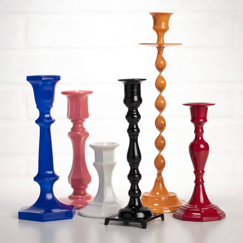 Colorful candlesticks on display. Enhance with Spray On Crystal Clear Acrylic Sealer For Crafts 12 Oz Gloss Finish That Dries Quick.