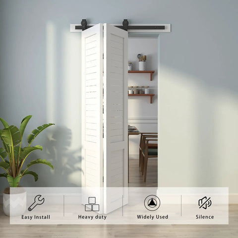 36 Inch Bi Folding Sliding Barn Door Hardware Track Kit with Heavy Duty Top Mounted Black Rollers, shown in a modern interior