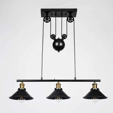 Front view of Three Light Pulley Pendant Island Light With Industrial Vintage Rustic Vibe installed, showcasing adjustable wire design.