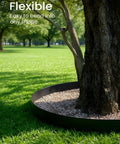 All In One Landscape Edging Kit 33 Feet Flexible 2 Inch Tall Garden Border around tree on grassy lawn