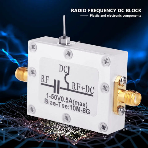 Two Pack Broadband Bias Tee Module 10 MHz To 6 GHz RF Microwave Coaxial Bias For Low Noise Amplifier Applications With Leakage Prevention And DC Isolation, metallic unit on textured background.