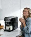 Fully Automatic Espresso Machine With Built In Adjustable Grinder And Auto Milk Frother Seven One Touch Brew Presets in kitchen with user.
