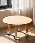 Round table with 2 Inch Swivel Caster Wheels For Furniture Set Of 4, Heavy Duty Rubber Casters With Locking Plate, installed on legs.