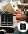 Pro Grade 28 Piece Cylindrical Punch Set With Positioning Base on workbench