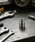 Tall Truck Lift Extension Adapter With 1.38 Inch Lift Heightening Leg And 1.54 Inch Hole Jack Riser with tools on workbench