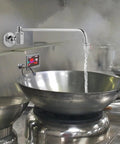 Heavy Duty 12 Inch Automatic Water Flow Swing Faucet For Commercial Wok Range Wall Mounted Pro Grade Kitchen Faucet Three Eighths Inch Swing Valve Chrome Plated Brass Silver Finish Restaurant Use in action over a wok