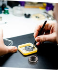 Close-up of clock dial in use with Vintage Mechanical Alarm Clock Repair Kit With Steel Spring Drill Press Quill Pro Grade Components.