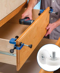Image of a person installing Pack Of Twelve 1 Inch Drawer Slide Roller Wheels Slick Gliding Pom Nylon Construction With Stainless Steel Threads.