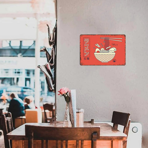Funny Vintage Metal Sign Ramen Noodle Tin Wall Art 8 By 12 Inch Decor in cafe with floral centerpiece on table.