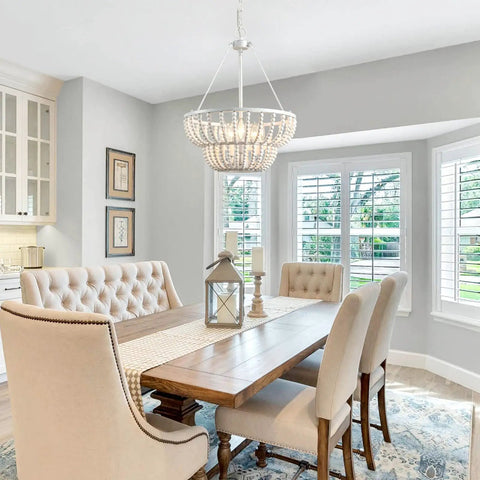 Dining room with 5 light beaded chandelier with rustic white wood beads farmhouse boho ceiling light fixture for dining room.