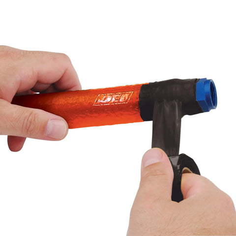 Quick Fix Tape 1 Inch By 12 Foot Self Curing Waterproof Silicone Insulation Tape being applied to a pipe