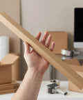 Heavy Duty Cardboard Wall Corner Protectors L Shaped Edge Guards For Shipping And Moving 20 Pack 0.15 Inch Thick panel in hand