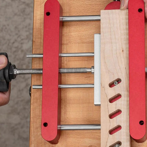 Precision Woodworking Mortise And Tenon Jig With Self Centering Loose Tenon Doweling Kit, showing red clamps and wood alignment.