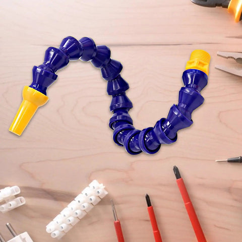 Heavy Duty Flexible Coolant Hose For Machine Shops Straight Up Rock Solid Water And Oil Delivery Tube With Swivel Threaded Ends on workbench.