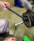 Mechanic using Long Reach Harmonic Balancer And Pulley Installer Kit with extra long forcing fasteners on engine pulley