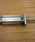 Bosch Rexroth Double Acting Cylinder 523-111-050-0 with 1/4 NPT port shown on wooden tabletop