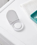 Close-up of 2 Pack Washing Machine Button Covers 41mm ID Safety Switch Guard Flip Top Self Adhesive For Laundry Appliances Easy Install