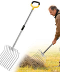 50 Inch Stainless Steel Garden Pitchfork With 10 Tine Head, Heavy Duty One Piece Construction in use for mulching hay