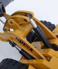 Close-up of Powerful 1 To 14 Scale RC Wheel Loader's hydraulic lifting system and alloy construction detail