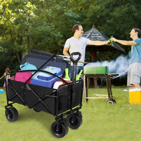 Foldable Wagon Cart With Big All Terrain Wheels And Drink Holders For Beach Camping Fishing Gardening Sports And Shopping Heavy Duty Frame Carries Up To 330 Pounds loaded with supplies at an outdoor event
