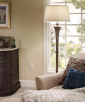 Living room interior with 20 Amp AFCI Outlet With Self Test, Tamper Resistant Receptacle And LED Indicator Light on wall.