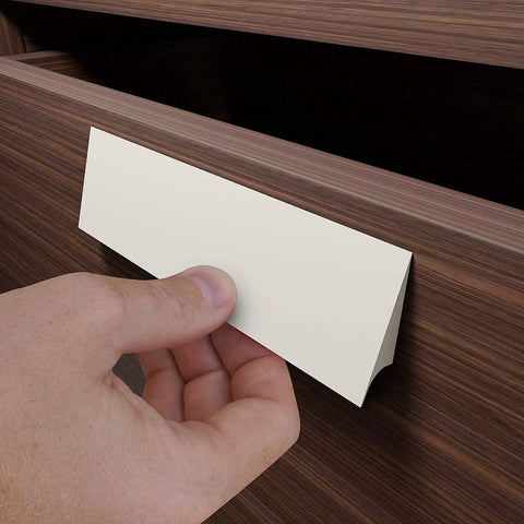 No Sweat Peel And Stick Finger Pull Handles For Cabinets, Screwless Adhesive Drawer Knobs that bond to wood, installed on a drawer.